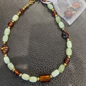 Beautiful beaded necklace and earrings set made by local artist